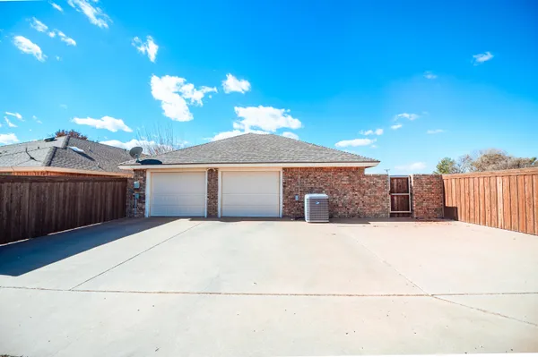 a view of a house with a garage