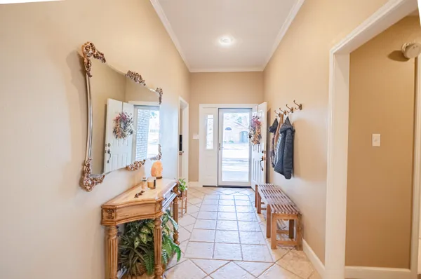 a room with furniture and a flat screen tv