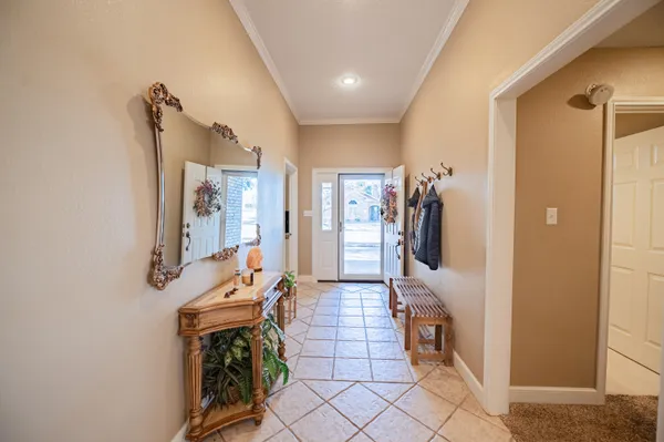 a view of a hallway with entryway