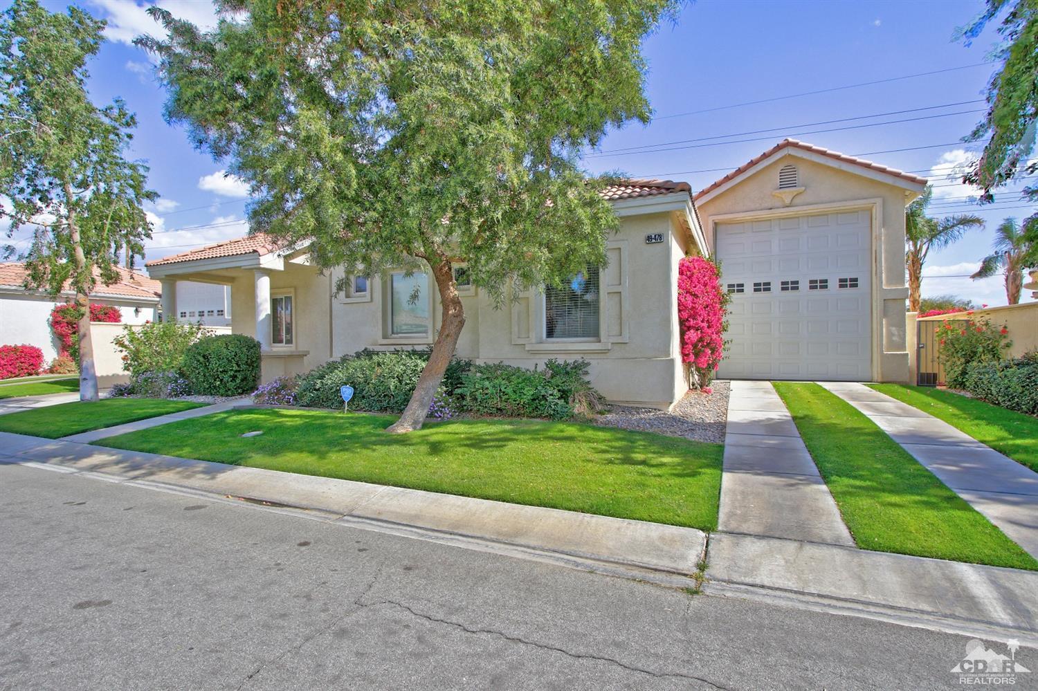 49478 Lewis Road Indio, CA 92201 - Photo 1 of 34 a front view of house with yard and green space