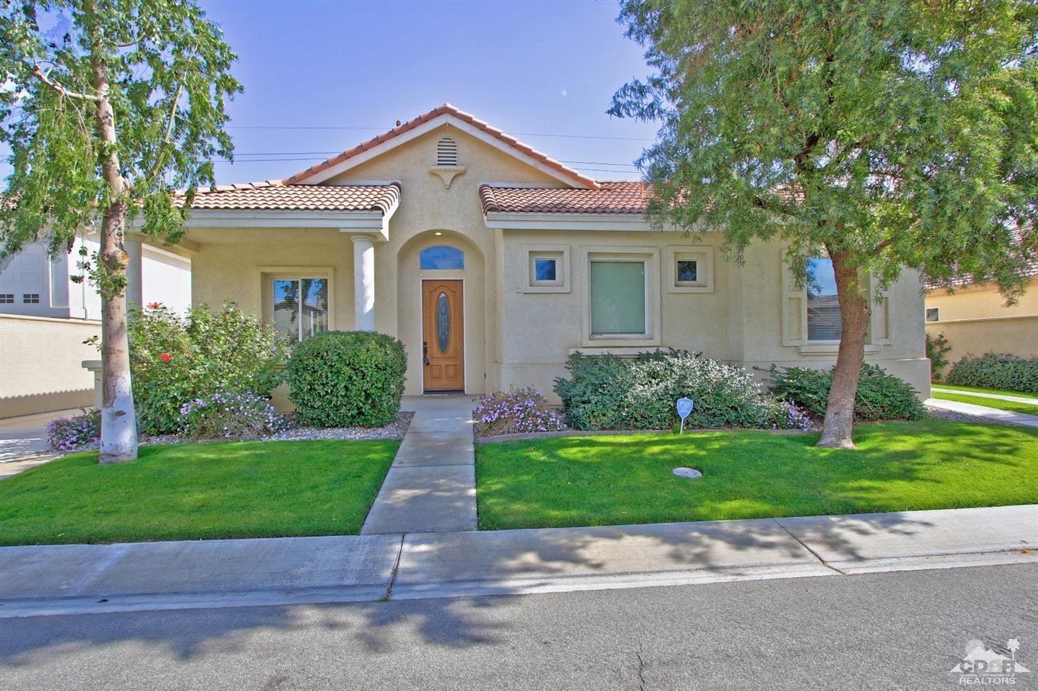 49478 Lewis Road Indio, CA 92201 - Photo 20 of 34 a front view of a house with a yard