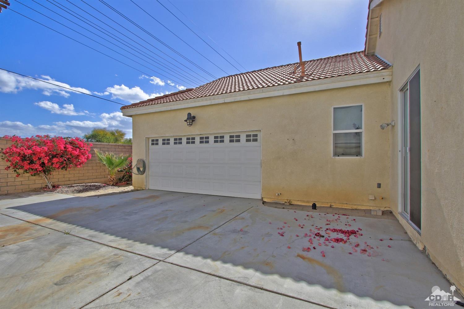 49478 Lewis Road Indio, CA 92201 - Photo 23 of 34 a front view of a building