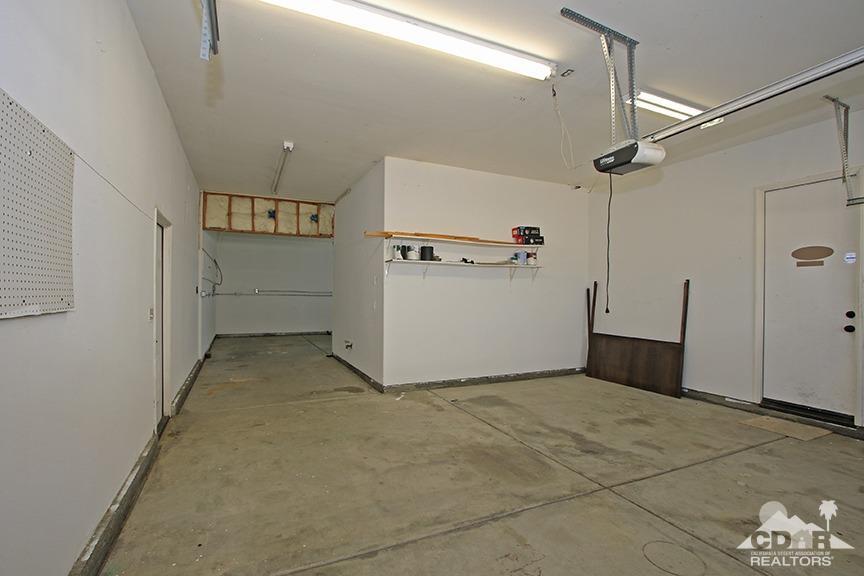 49478 Lewis Road Indio, CA 92201 - Photo 30 of 34 a view of a storage & utility room with a sink