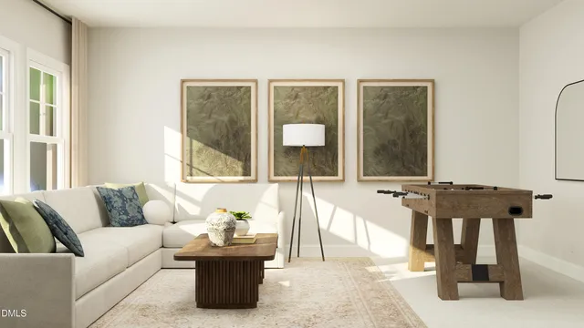 a living room with furniture and large windows