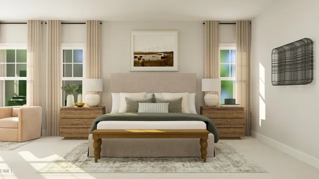 a bedroom with a bed couch and a window