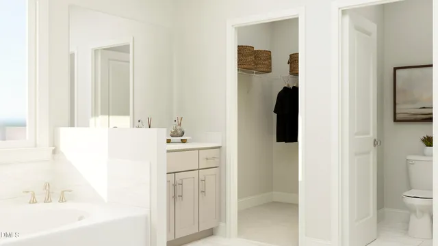 a bathroom with a bathtub sink and toilet