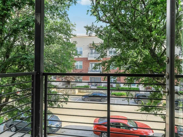 a view of a balcony with lake view