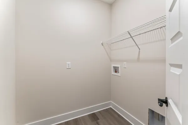 a view of a room with racks on the wall