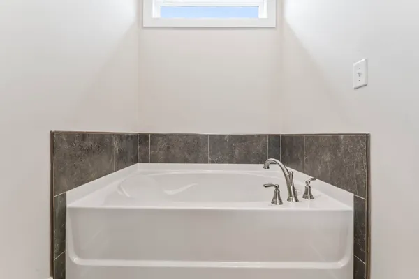 a bathroom with a bathtub