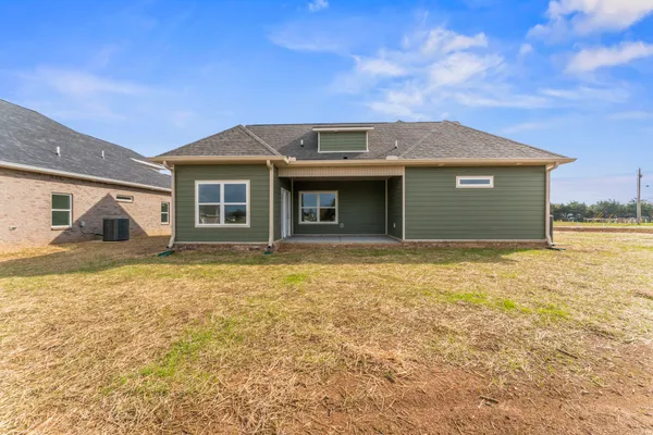 a house view with a garden space