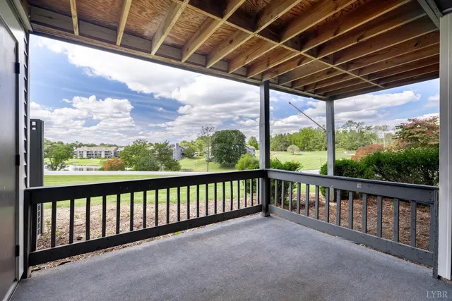 a view of porch with a swimming pool