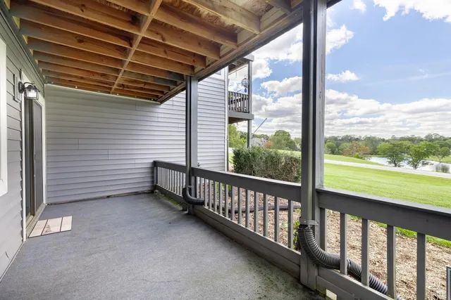 a view of a back yard from a balcony