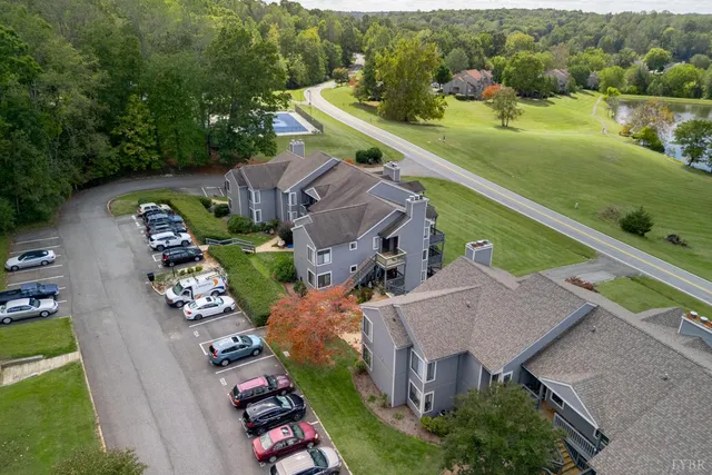 an aerial view of a house with a garden