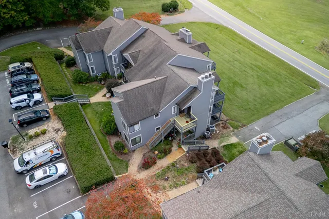 an aerial view of a house with a garden