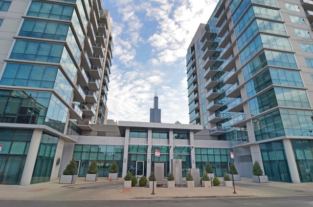 125 South Green Street, Unit 409A Chicago, IL 60607 - Photo 1 of 18 a view of a building and a street