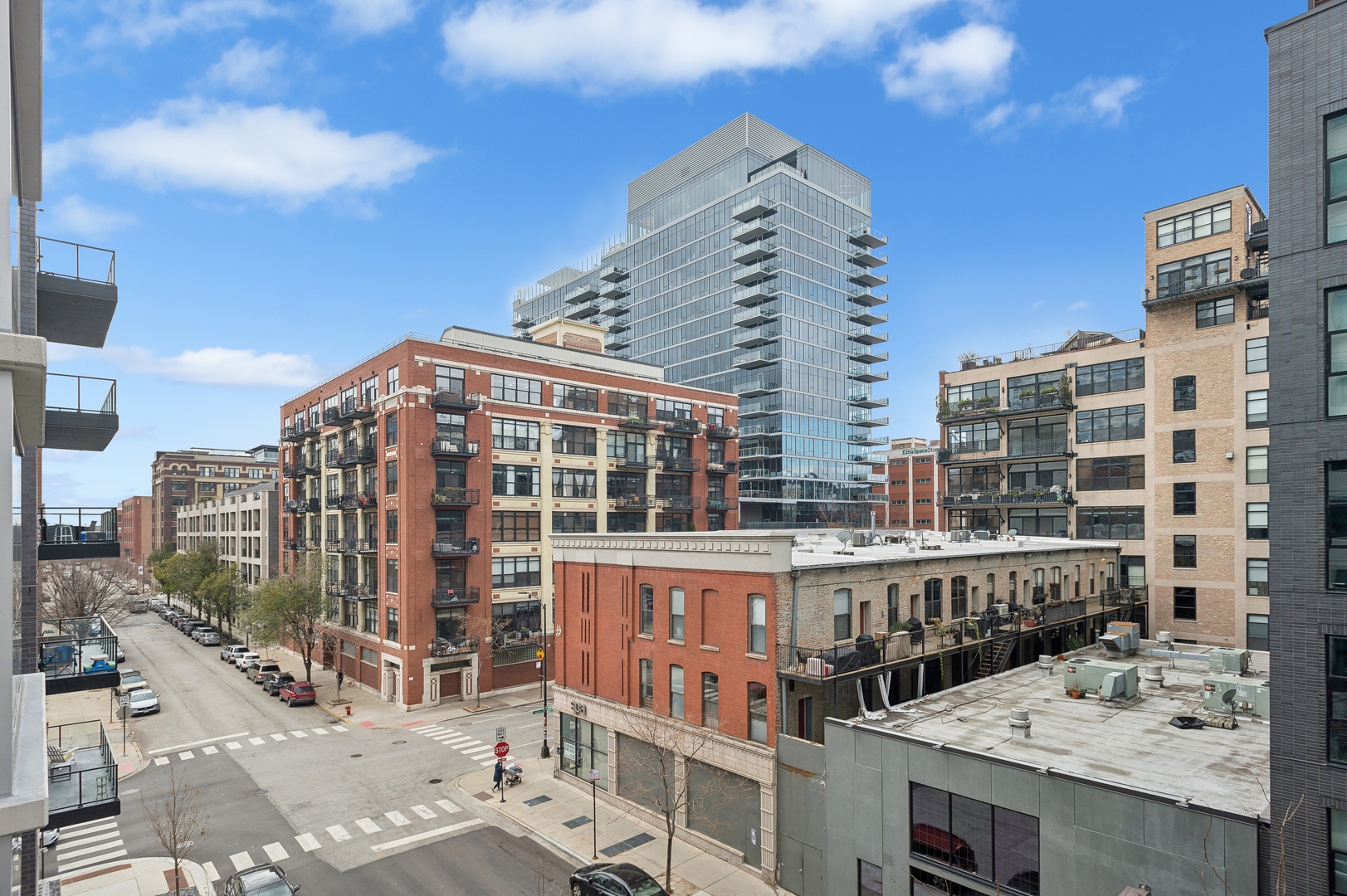 125 South Green Street, Unit 409A Chicago, IL 60607 - Photo 16 of 18 a view of a building from a balcony