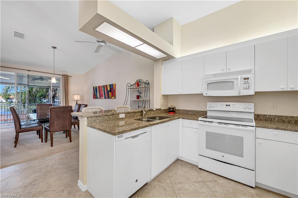 7475 Jacaranda Park Road, Unit 203 Naples, FL 34109 - Photo 5 of 33 Kitchen