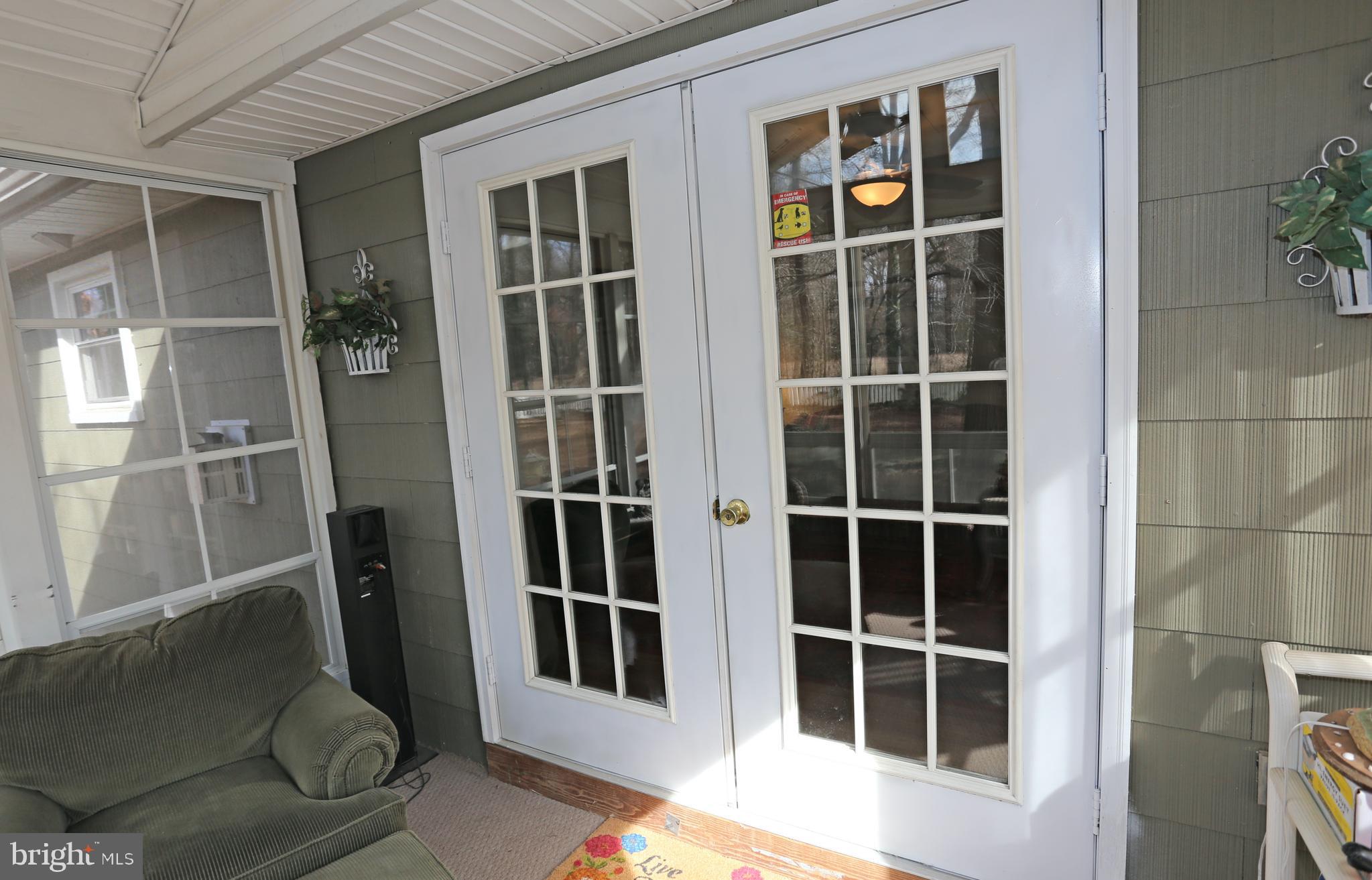 22296 Breasure Road Georgetown, DE 19947 - Photo 33 of 47 French doors leading to sun room