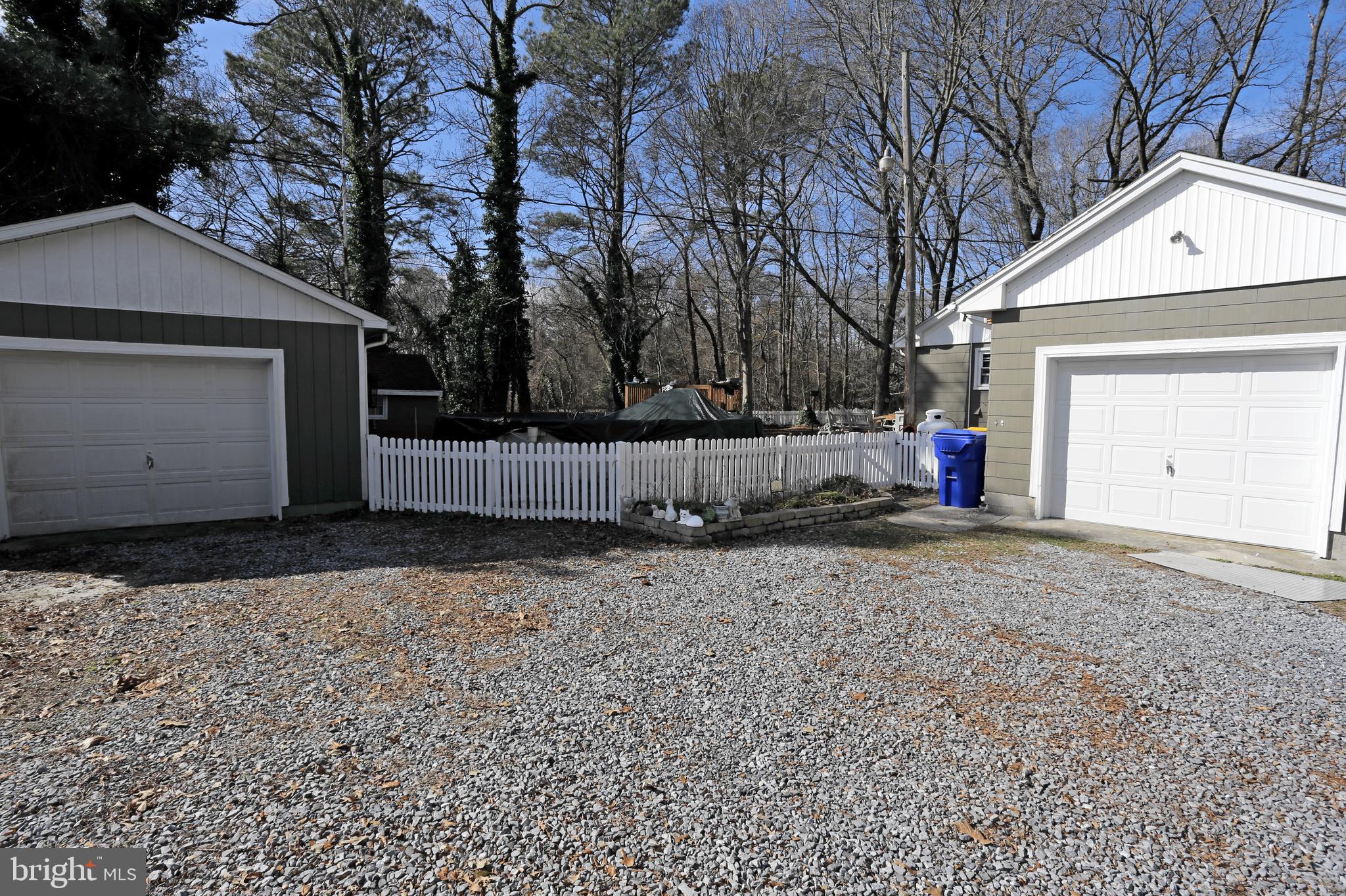 22296 Breasure Road Georgetown, DE 19947 - Photo 40 of 47 Large driveway, attached and detached garages