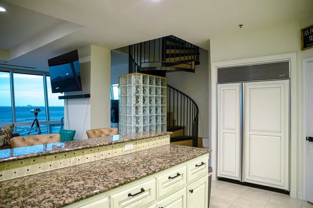 a view of a kitchen from a kitchen