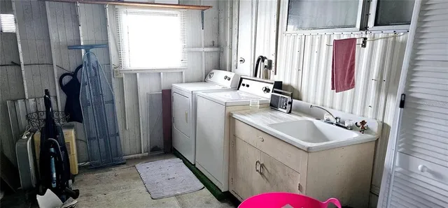 a bathroom with sink and mirror