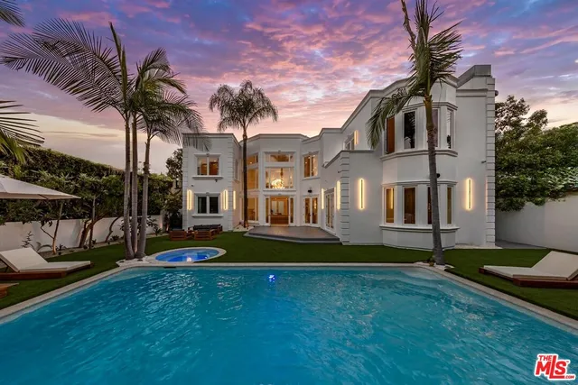 a view of a house with swimming pool yard and porch