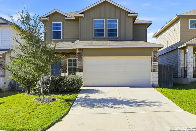 a front view of house with yard