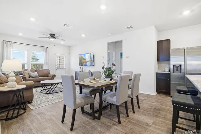 a view of a dining room with furniture