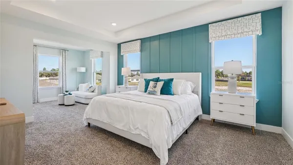 a bedroom with bed and window