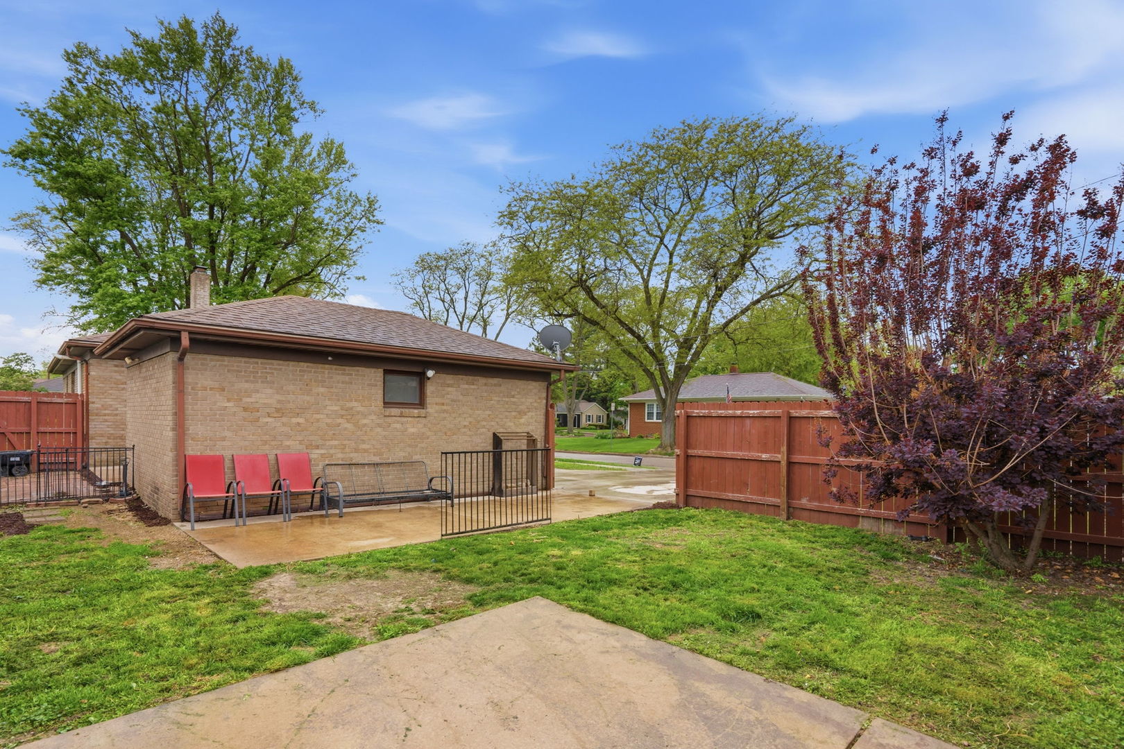 2730 4th Street Moline, IL 61265 - Photo 3 of 25 a view of a backyard with a garden