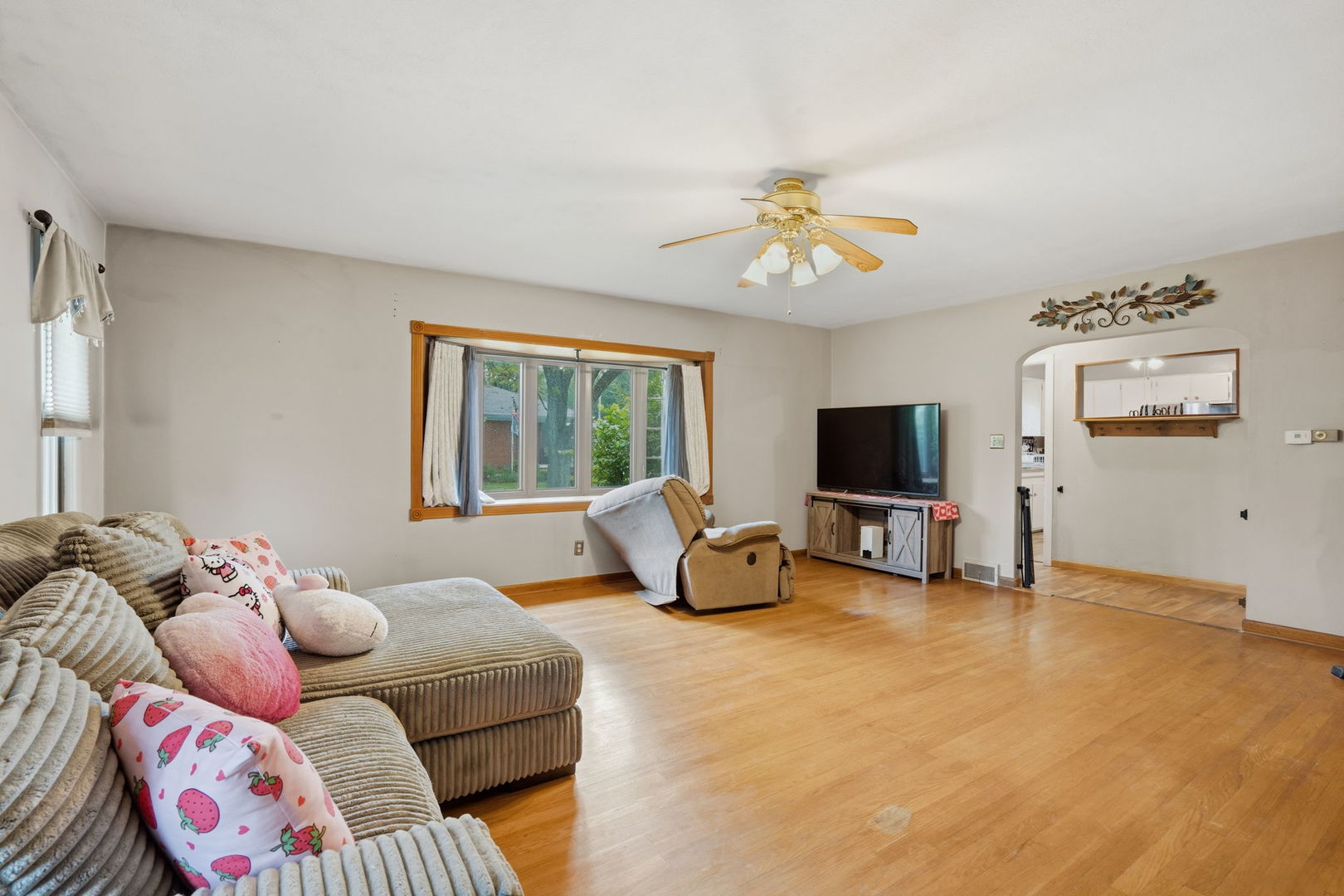 2730 4th Street Moline, IL 61265 - Photo 5 of 25 a living room with furniture and a flat screen tv