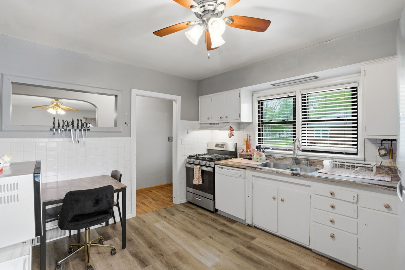 2730 4th Street Moline, IL 61265 - Photo 9 of 25 a kitchen with a sink cabinets and window