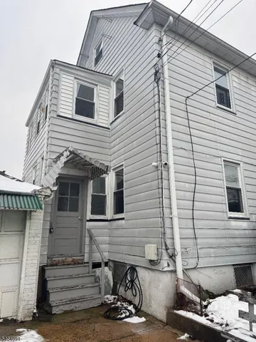 a view of a house with a patio