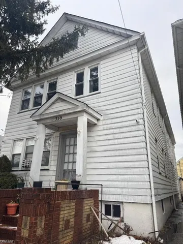 a front view of a house with windows