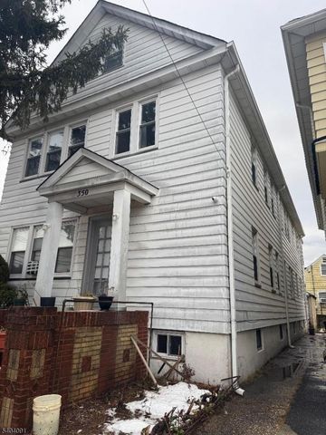 a front view of a house with garage
