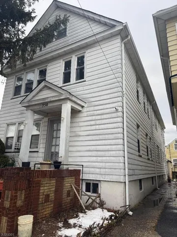 a front view of a house with garage