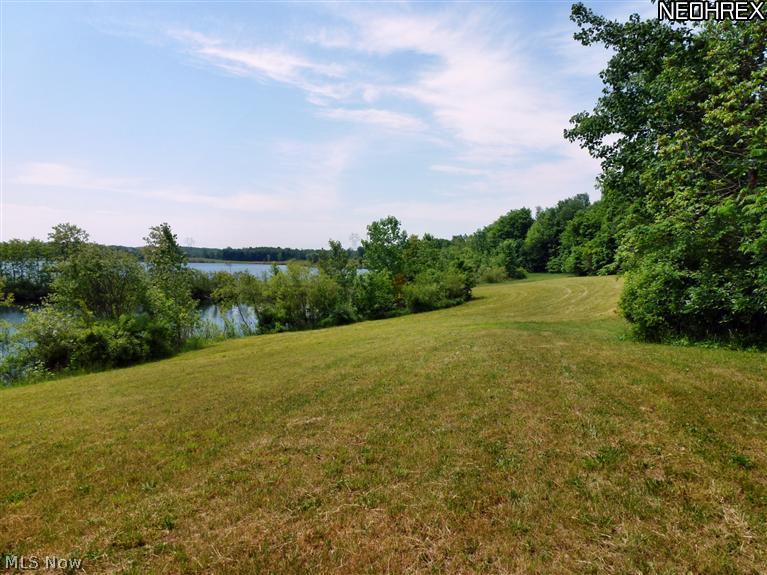 8965 Price Road Ravenna, OH 44266 - Photo 4 of 10 View from the building site looking back towards the access from the causeway/driveway and across the adjacent quarry lake.