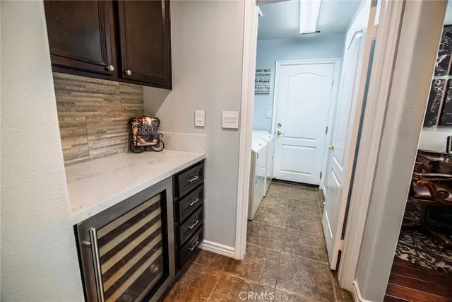 a kitchen with a sink and a stove top oven