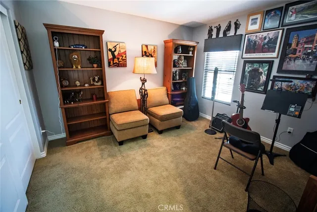 a view of an entryway with furniture and storage