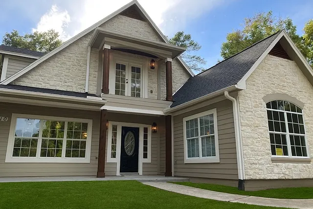 front view of a house with a yard