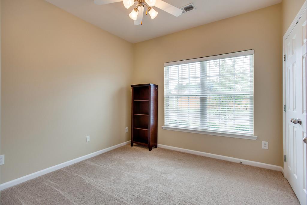 1038 Golf View Way Spring Hill, TN 37174 - Photo 13 of 16 a view of an empty room with a window