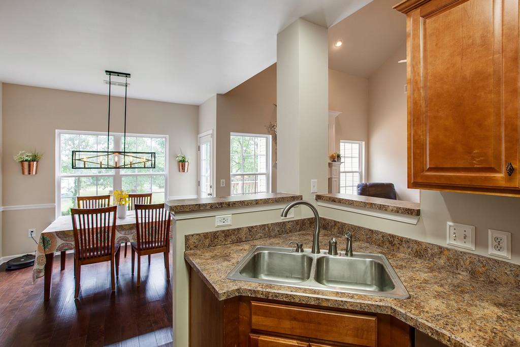 1038 Golf View Way Spring Hill, TN 37174 - Photo 8 of 16 a kitchen with a sink and a large window