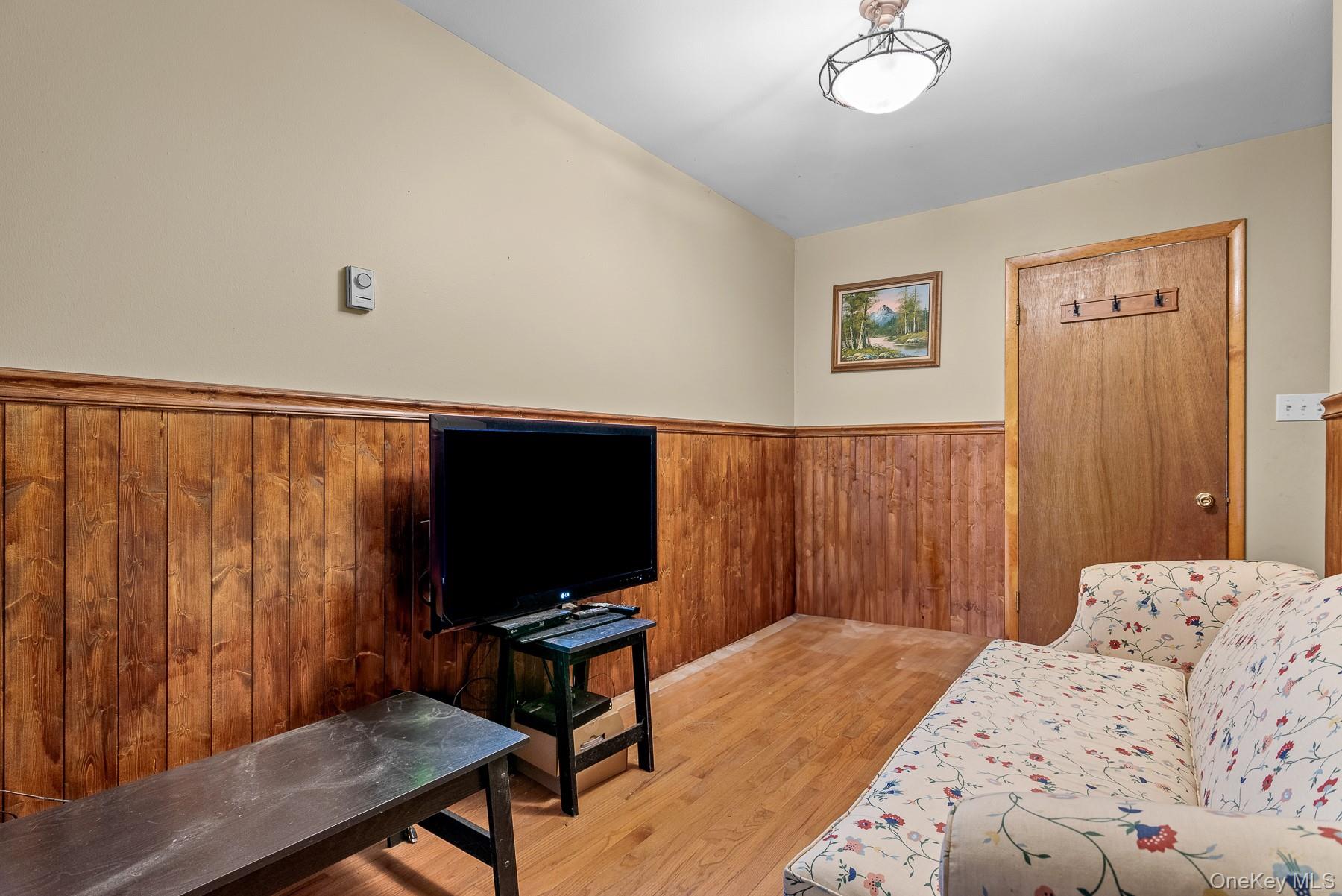 515 Magic Mountain Road Bloomville, NY 13739 - Photo 13 of 18 a bedroom with a bed and a television