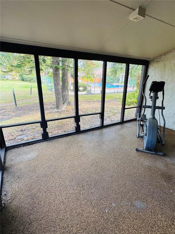 4100 Player Circle, Unit 101 Orlando, FL 32808 - Photo 31 of 34 a view of empty room with large windows