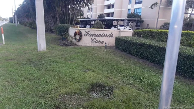 a sign on the side of the road