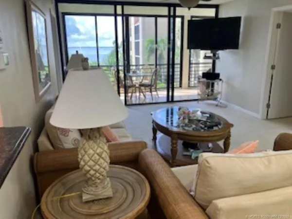 a room with furniture and wooden floor