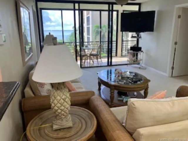 a room with furniture and wooden floor