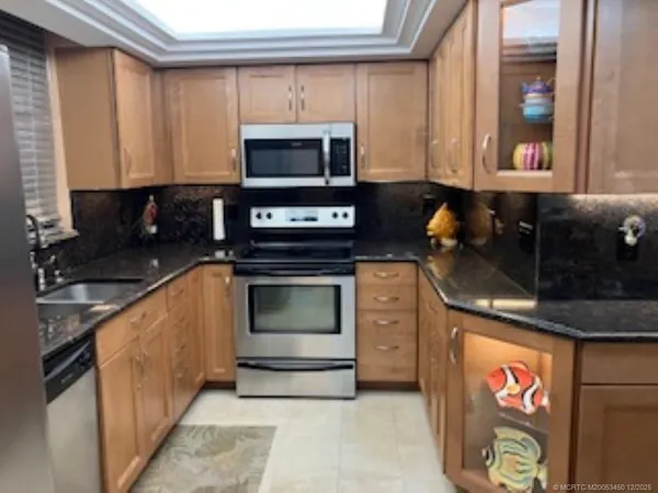 a bedroom with a bed and a table