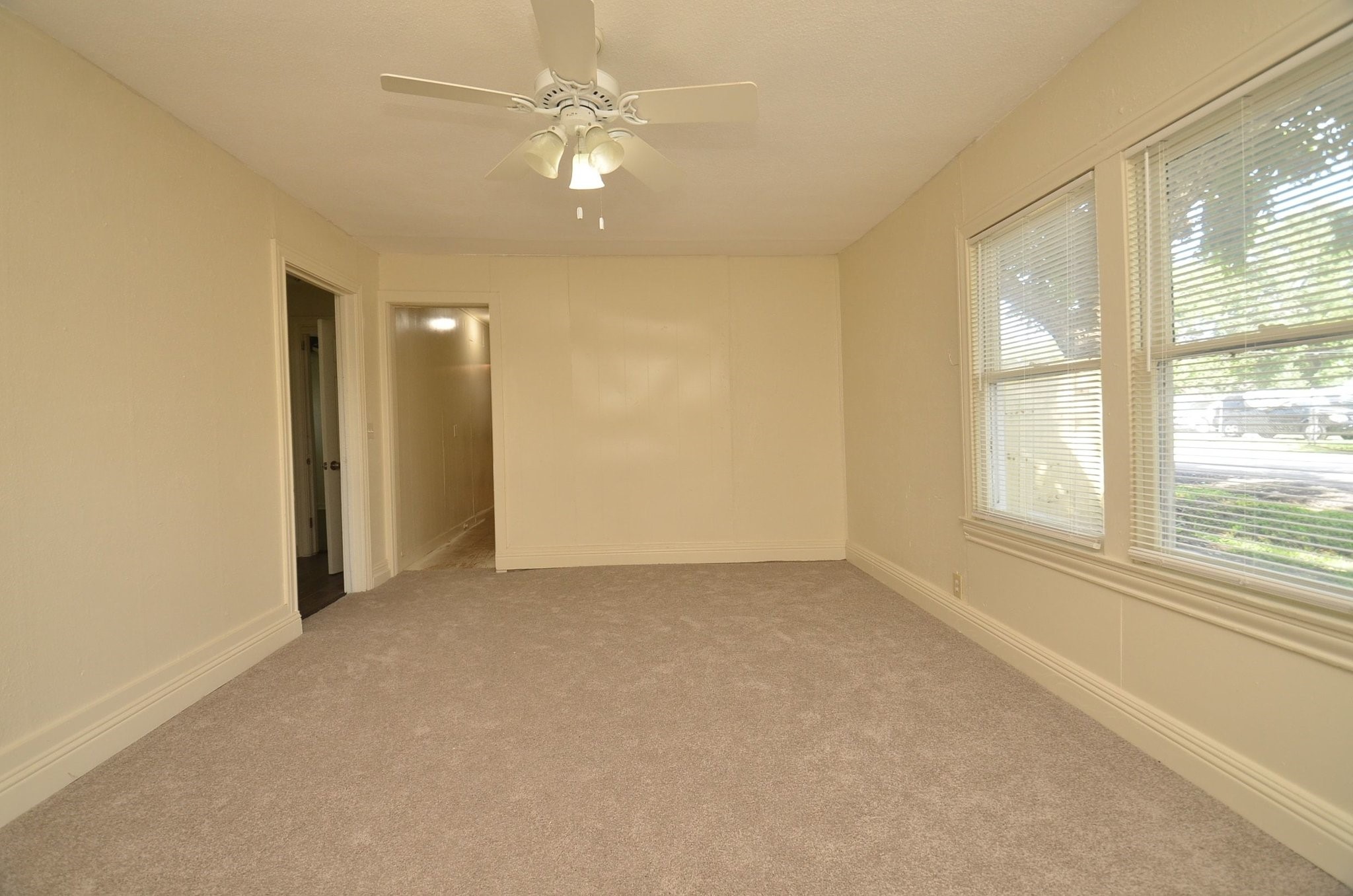 1600 5th Street Rosenberg, TX 77471 - Photo 8 of 24 Comfortable living room filled with natural light.
