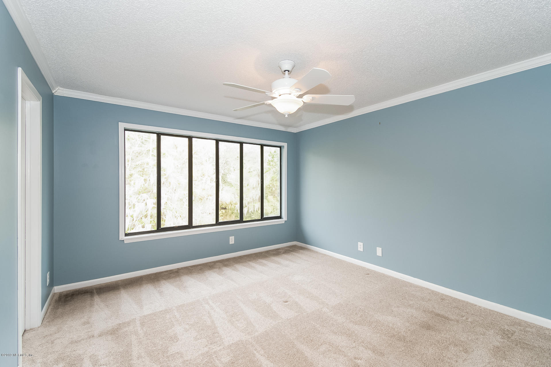 5478 Stanford Road Jacksonville, FL 32207 - Photo 14 of 26 a view of an empty room with a window